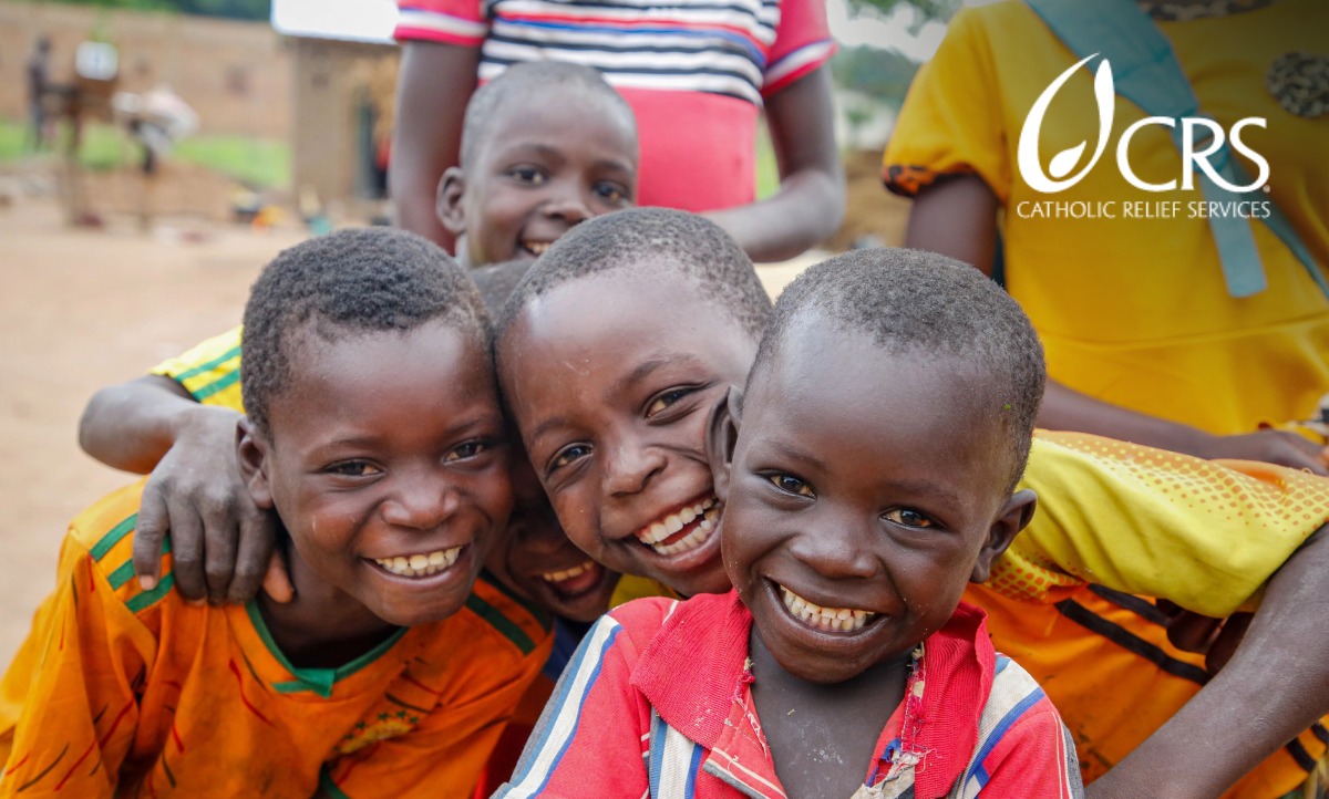 Group of children smiling.